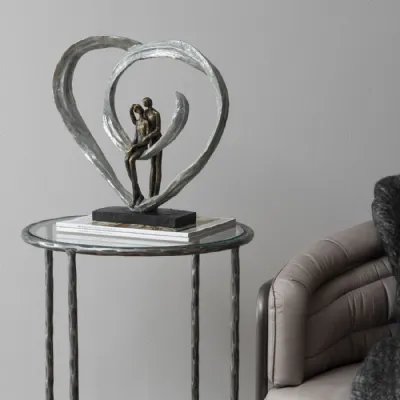 Bronze Love Sculpture In Circular Heart