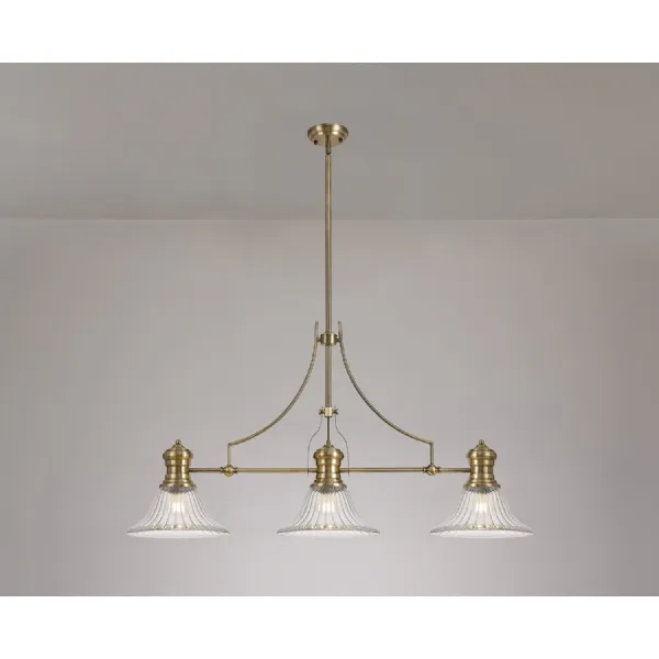 Sandy 3 Light Linear Pendant E27 With 30cm Bell Glass Shade, Antique Brass, Clear