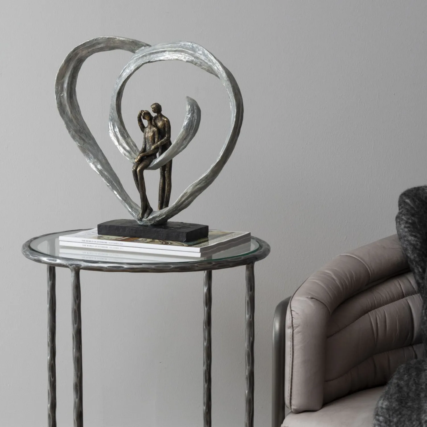 Bronze Love Sculpture In Circular Heart