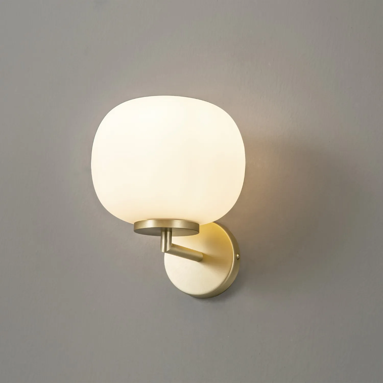 Sevenoaks Small Oval Ball Wall Light 1 Light E27 Satin Gold Base With Frosted White Glass Globe